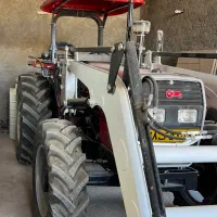 یک دستگاه تراکتور صفر و یک عدد چکش هیدرولیکی