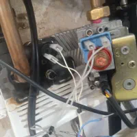 تعمیرات پکیج،تعمیرپکیج،لوله کشی اب وفاضلاب،بوتان