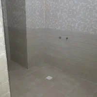 کاشیکاری و سرامیک کاری کف‌وبدنه چسبی