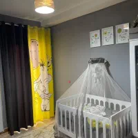 تخت گهواره ای به همراه پرده و روتختی و لوستر