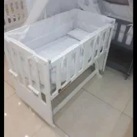 گهواره کنار مادر