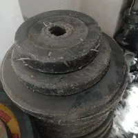 دمبل و پلیت کارکرده