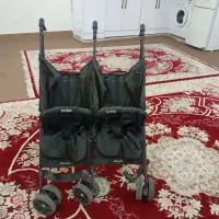 کالسکه دوقلویی عصایی