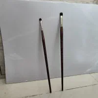 مقداری ابزار نقاشی قلمو کاغذ A3 پاک کن