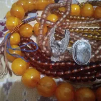 انگشتر نقره و تسبیح سندلوس