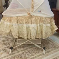 گهواره و تخت کناره مادر