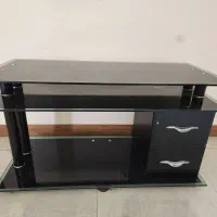 میز تلویزیون شیشه‌ای