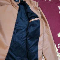 کاپشن چرمی|لباس|اهرم, |دیوار