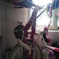 دوچرخه دخترانه رنگ صورتی
