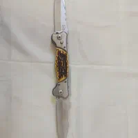 فندک سنگی مارک ( هارلی دیوید سون ) و چاقوی دو سر