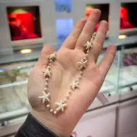 آویز های ریسه ای مروارید و صدف اصل