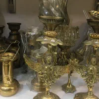 میوه خوری کنارسالنی برنز و دوعدد شمعدان برنز
