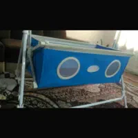 گهواره و کریر و کیف نوزادی زرشکی