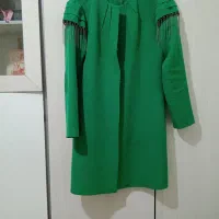 مقداری لباس تمیز ومرتب|لباس|نیشابور, گنبد سبز|دیوار