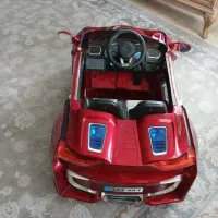 ماشین شارژی دارای مانیتور،فلش خور، درب خودرو خفاشی