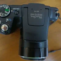 دوربین کامپکت فیلمبرداری و عکاسی کانن مدل SX510 HS