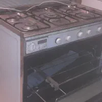 اجاق گاز فردار رو استیل ۳جوجه گردان درحد نو