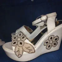 کفش|کیف، کفش، کمربند|تربت جام, میان جام|دیوار