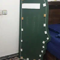 اینه قدی به شکل صورت ادم و نور مخفی