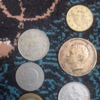 سکه قدیمی و سنگ معاوضه با پرنده موقعیت باخرز