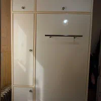 تخت تاشو و کمد و میز تحریر و کتابخانه