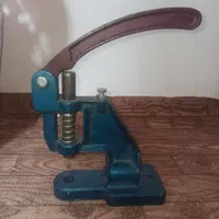 دستگاه پرس دکمه