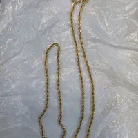 زنجیرطلا نو شیک و انگشتر روی تابلو