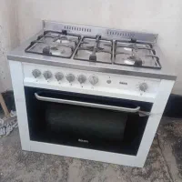 اجاق گاز طرح فر سینجر سالم و تمیز