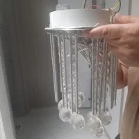 لوستر کریستالی در حد نو با نورپردازی زیبا