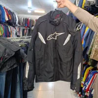 کاپشن لباس شلوار موتور استوک