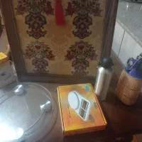 یک عدد آینه شمعدان چوبی و قاب