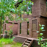 سازه تریبلکس چهارخواب با نمای شیشه‌ای