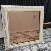 اینه شامپاینی با قاب ورساچه وقندان