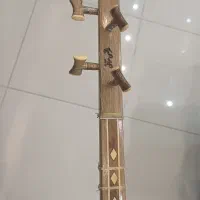 سه تار ستار ساخت استاد مرآتی|سازهای سنتی|تهران, فلسطین (میدان انقلاب)|دیوار