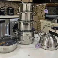 سرویس قابلمه وکتری استیل کرکماز ۱۲پارچه کف چدن|ظروف پخت‌وپز|قم, نیروگاه|دیوار