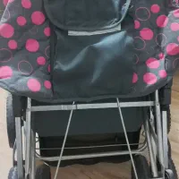 کالسکه دوقلو بچه با کریر