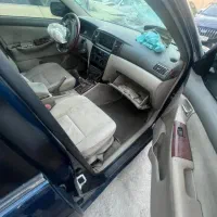 تصادفی  کورولا ۲۰۰۷فول سرمه ای