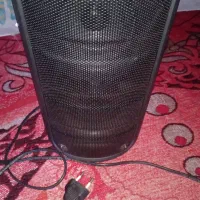 یک اسپیکر|پخش‌کننده همراه|بردسیر, |دیوار