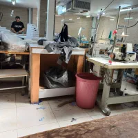 وسط کار و چرخکار و بیرون بر تنه پیراهن مردانه