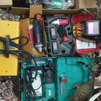 تراز لیزری و دریل شارژی دست دوم در حد نو