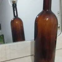 بطری شیشه ای یک لیتری در چوبی(پنبه دار)|ظروف نگهدارنده، پلاستیکی، یکبارمصرف|اهواز, سیصد دستگاه|دیوار