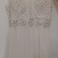 لباس مجلسی|لباس|اقبالیه, |دیوار