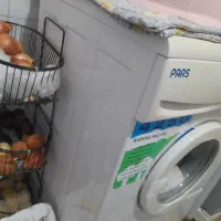 لباسشویی و میز ناهار خوری