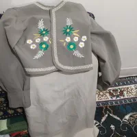 یک عدد مانتو و شلوار نو