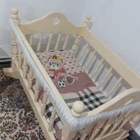 تخت گهواره ای نوزاد