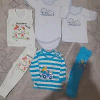 لباس نوزاد همشون باهم ۳۰۰