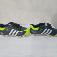 کفش فوتبالی|کیف، کفش، کمربند|صحنه, |دیوار