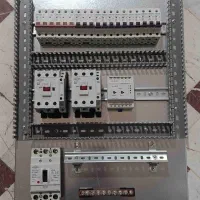 تابلو برق صنعتی سازنده تابلوهای برق برقکار صنعتی|ماشین‌آلات صنعتی|قم, هفت تیر|دیوار