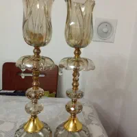 یک جفت شعمدان و شاخه نبات