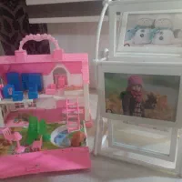 قاب عکس چرخ وفلکی و خانه بازی